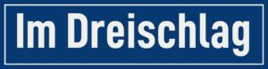 Straßenschild Im Dreischlag