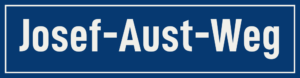 Straßenschild Josef-Aust-Weg